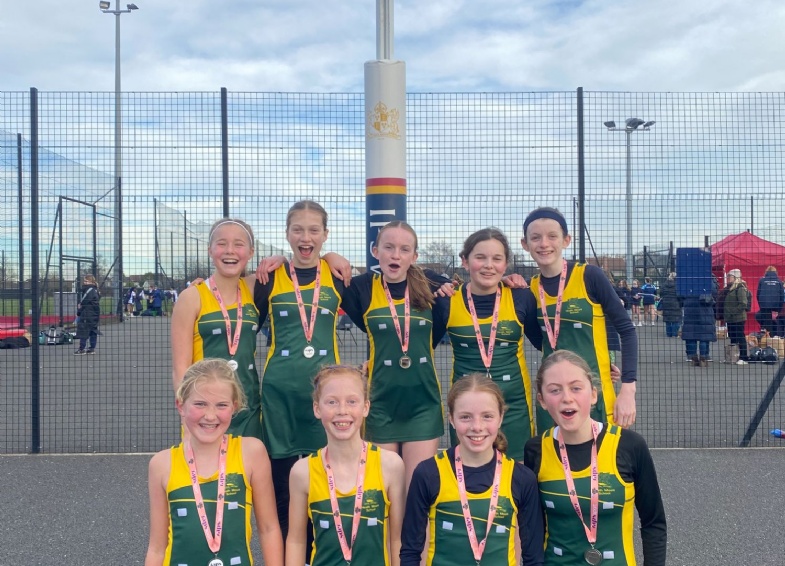 U13 Netball Team With Their Medals Win Place at IAPS National Netball Finals